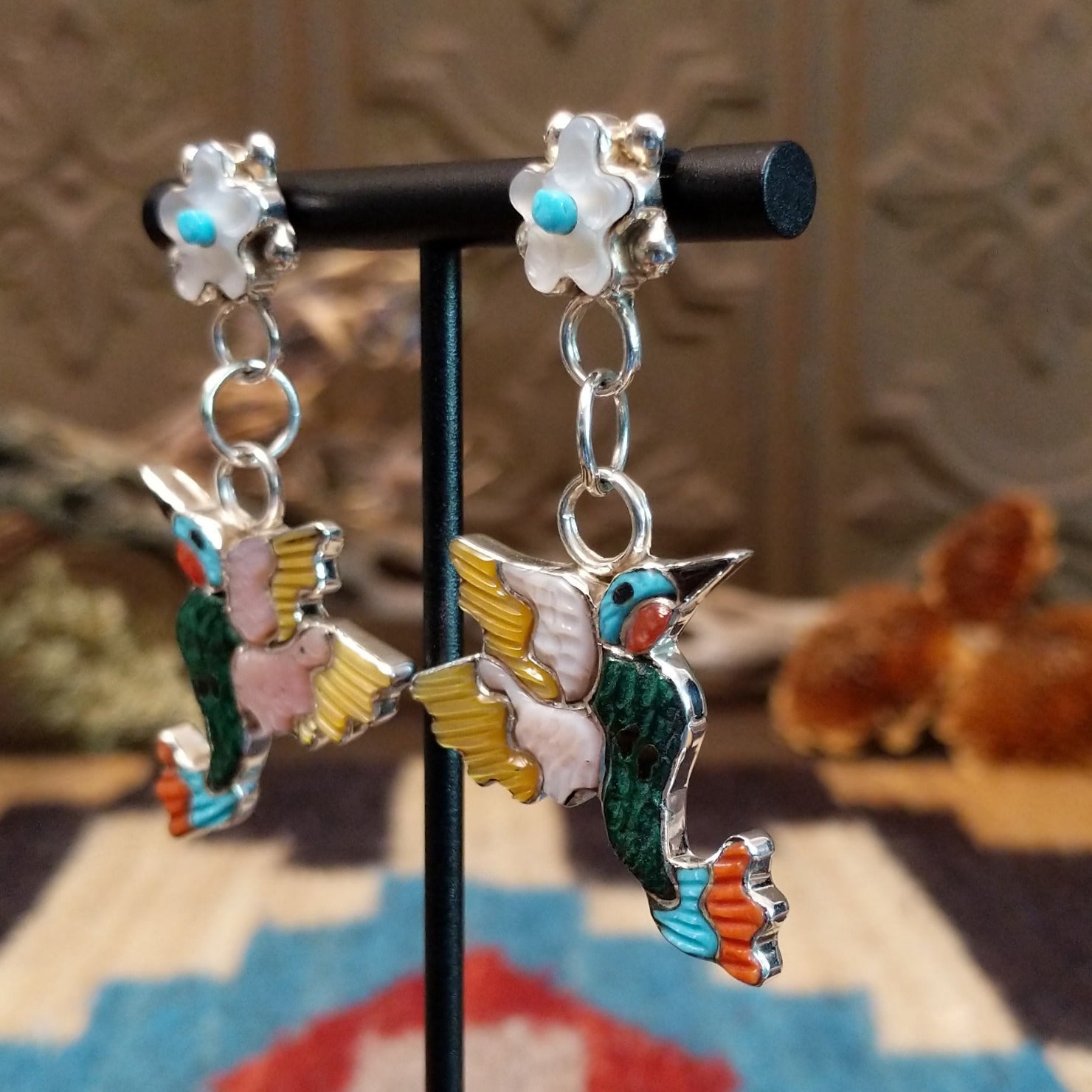 Sterling silver hummingbird earrings with multistone inlay.