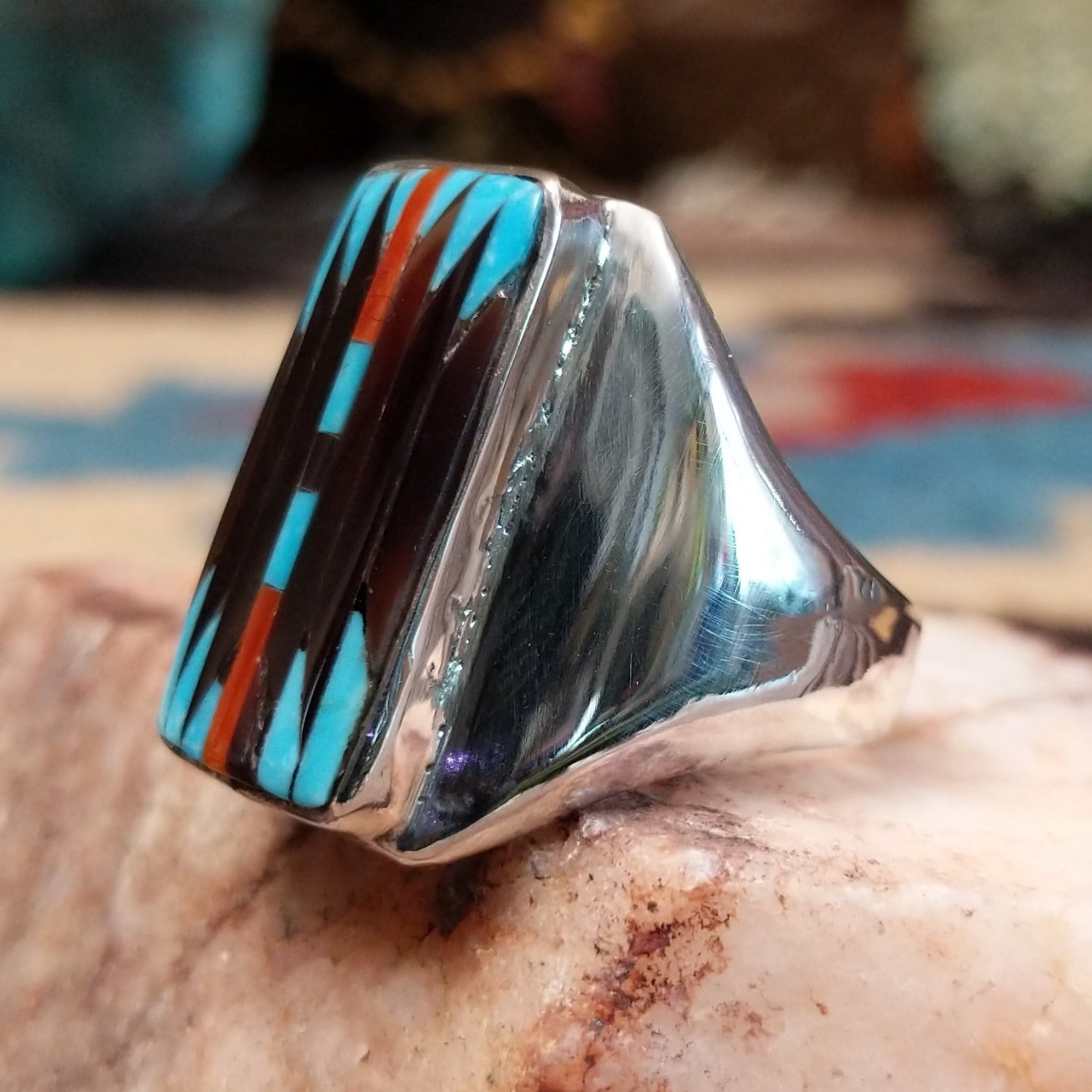 Sterling silver rectangular ring with multistone inlay.