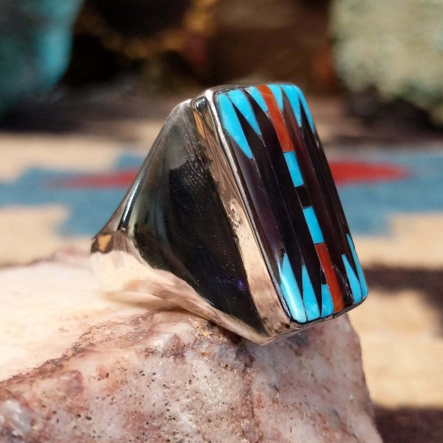 Sterling silver rectangular ring with multistone inlay.