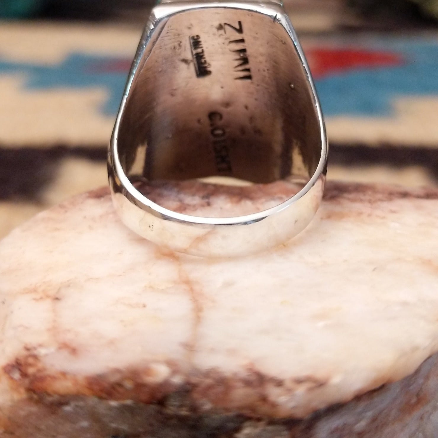 Sterling silver rectangular ring with multistone inlay.