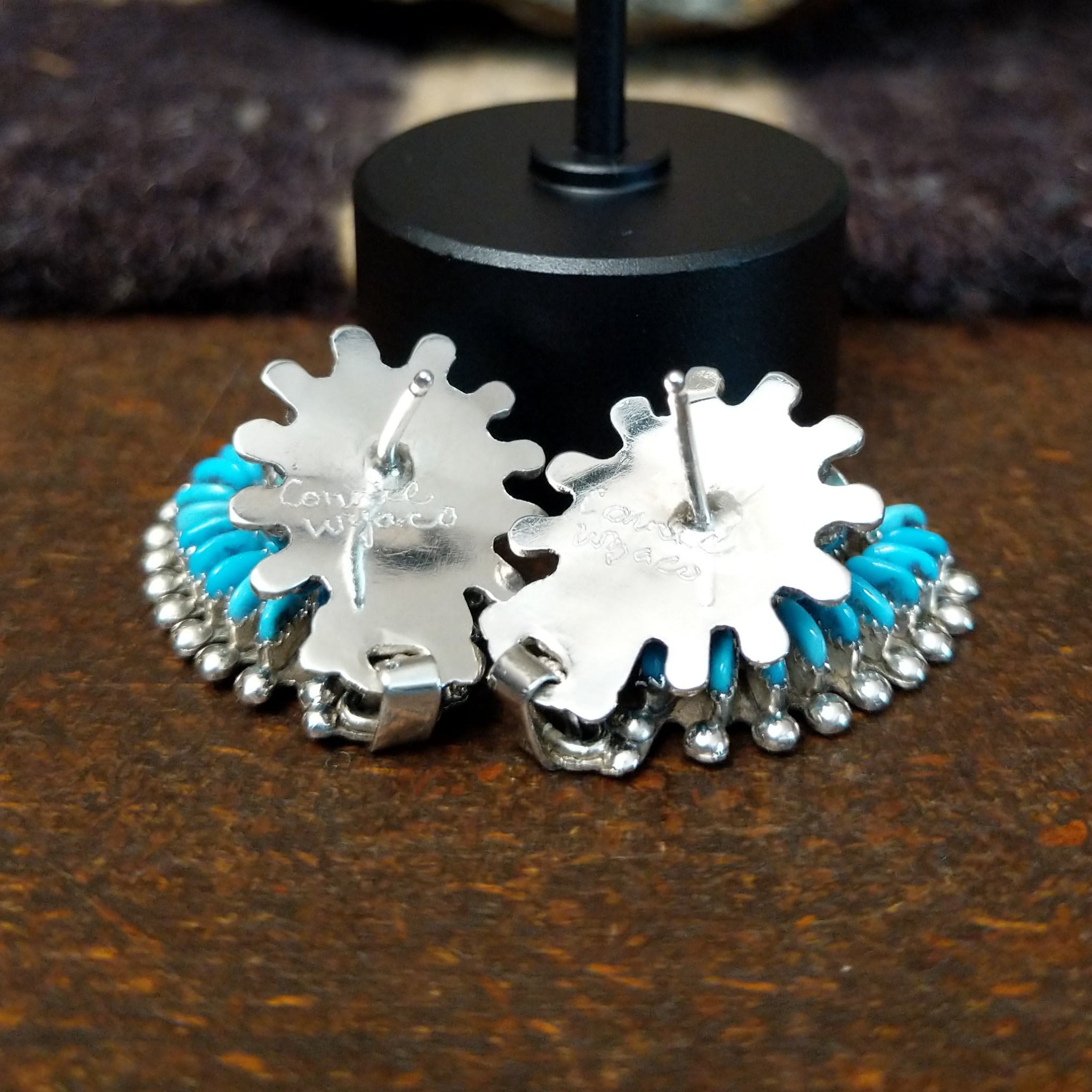 Handcrafted sterling silver Zuni needlepoint turquoise concho earrings by Connie Wyaco, featuring a two-piece dangle design with vibrant turquoise needlepoint; artisan signature.