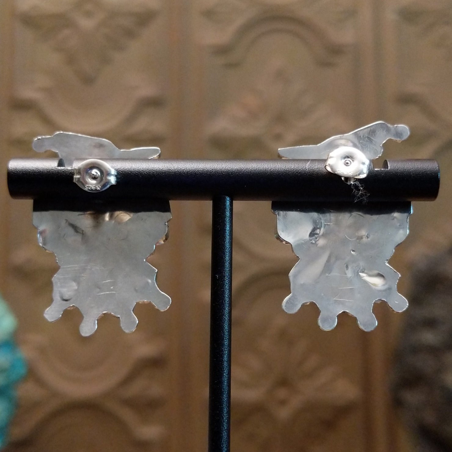 Close-up of artisan's etched signatures.