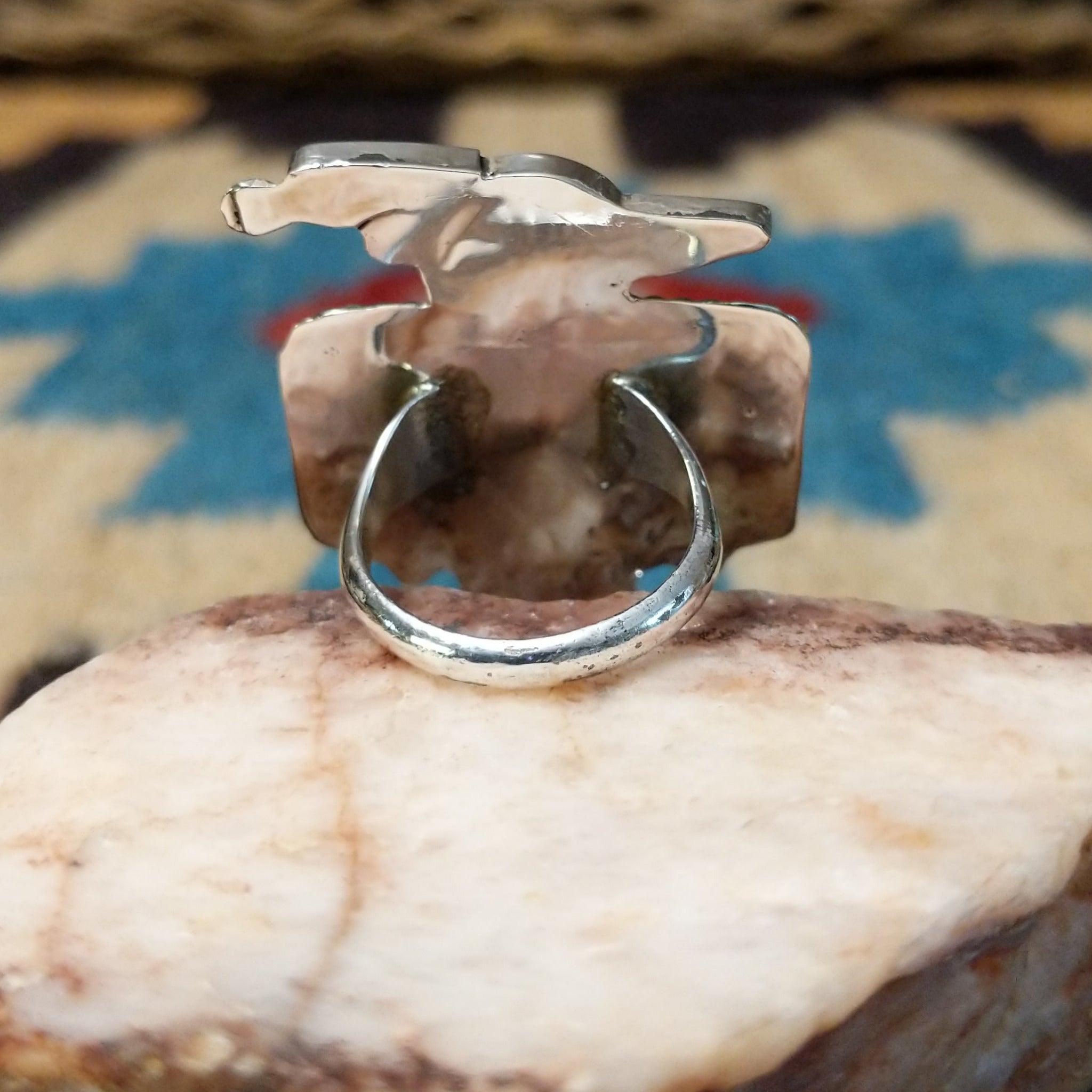 Zuni Thunderbird ring, featuring a handcrafted sterling silver Thunderbird design with intricate detailing and traditional Southwestern craftsmanship. Underside view.