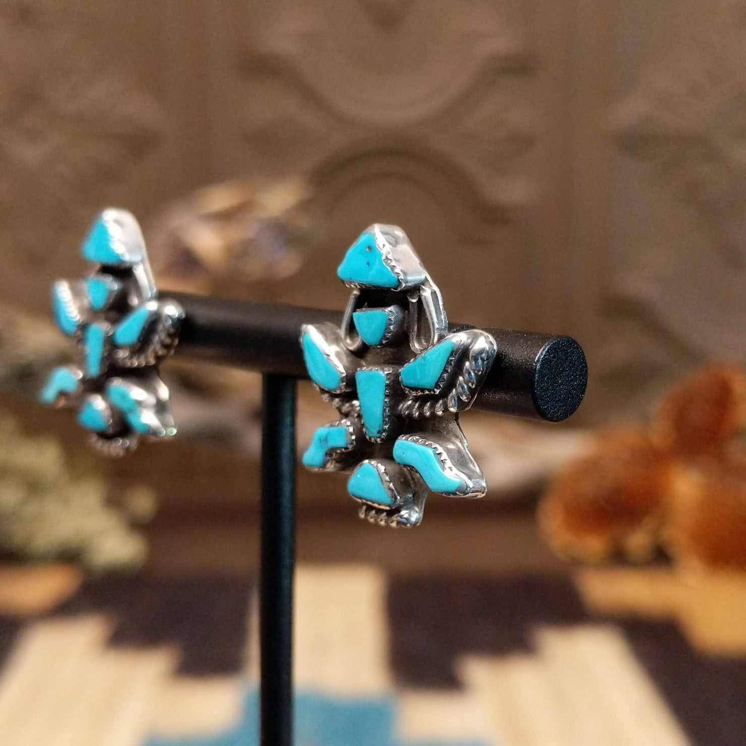 Sterling silver earrings with turquoise set in the dancer bezels.