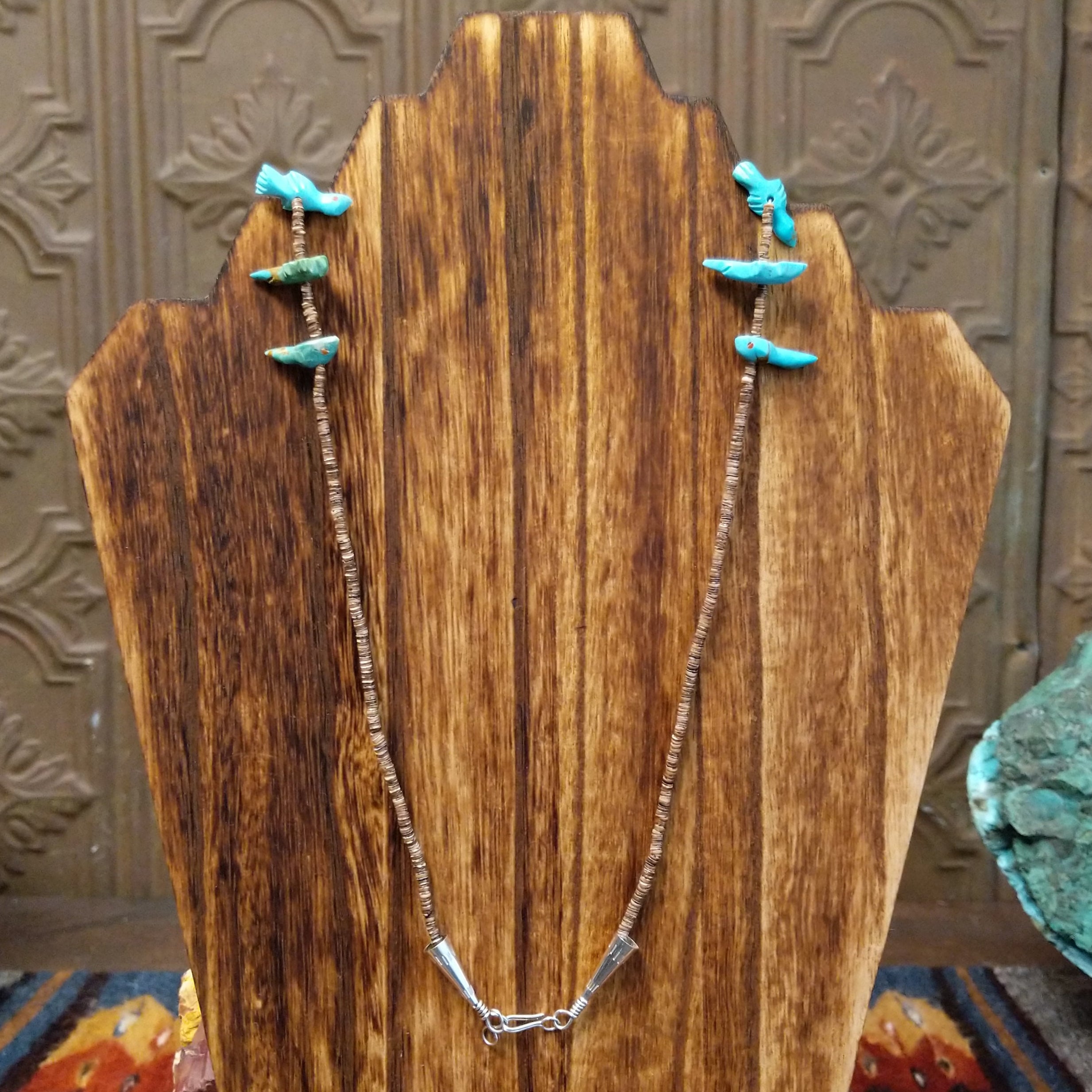 The necklace’s back reveals the pen shell heishi beads and sterling silver clasp.