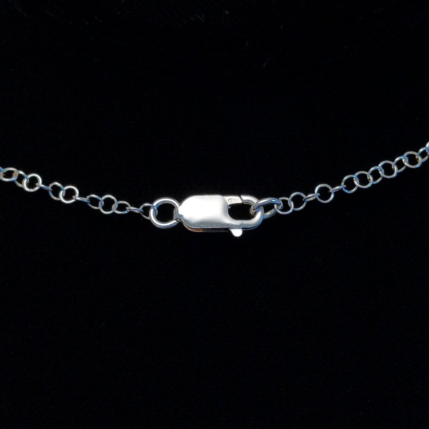 Close-up of the clasp on the necklace.