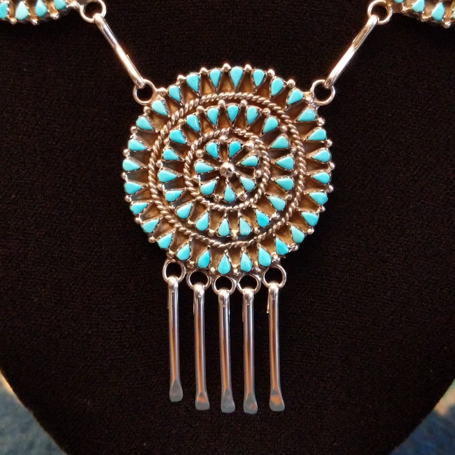 Turquoise petit point necklace set in sterling silver.