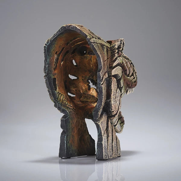 Back view of T-rex head sculpture