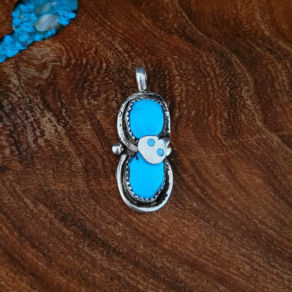 blue turquoise snake pendant front view