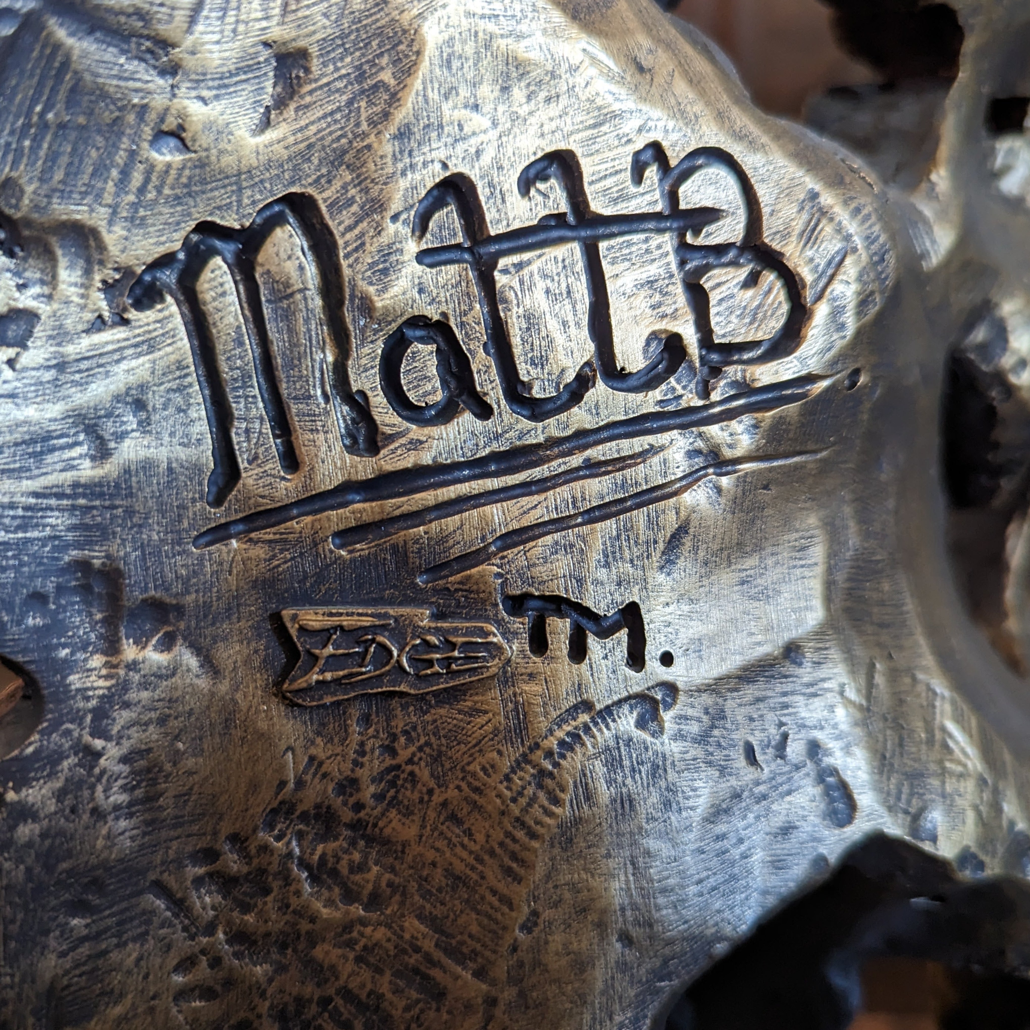 edge sculpture lion head artist mark