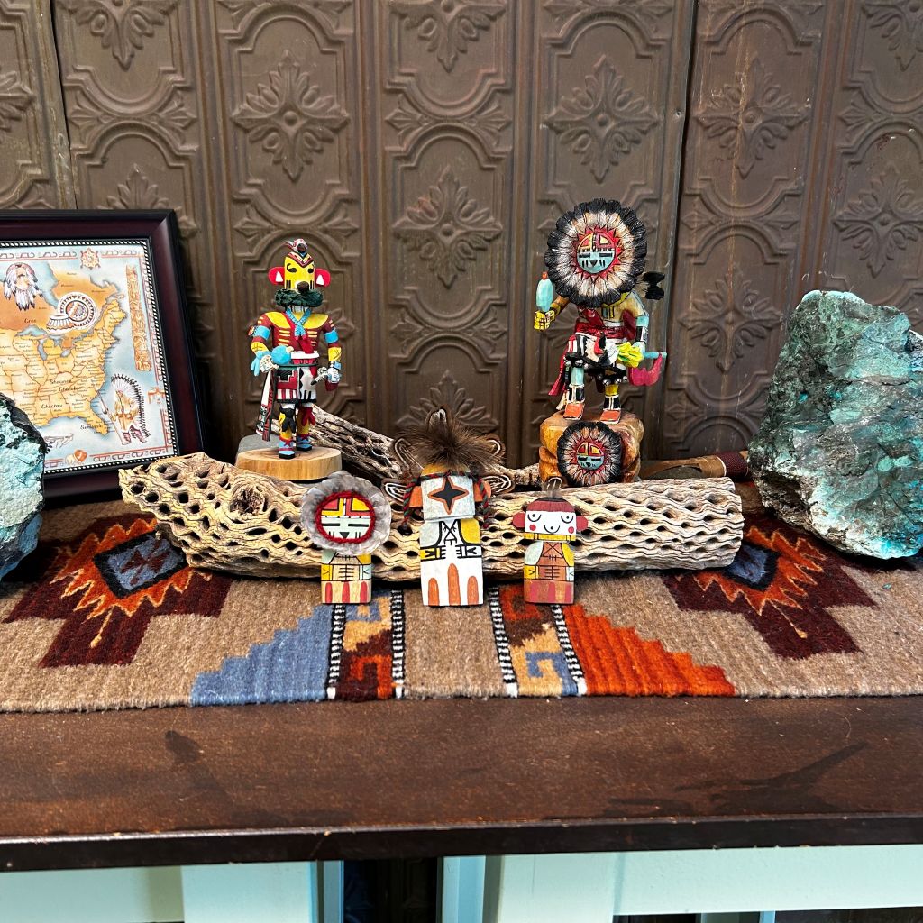 Hopi kachinas made in various styles, materials, and colors.