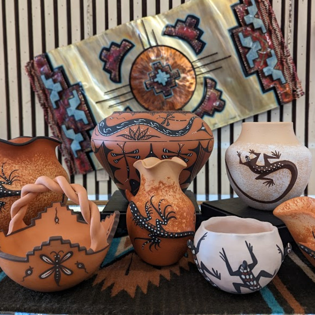 a collection of native american made pottery