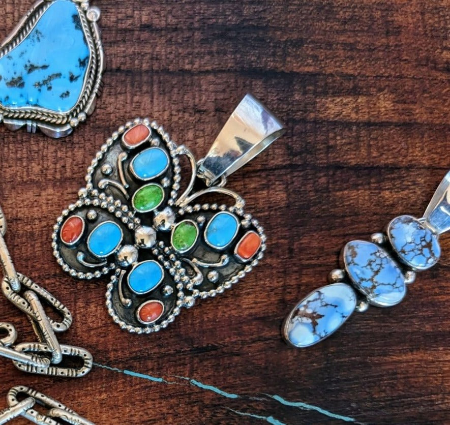 Native American made sterling silver and turquoise pendants