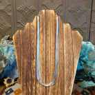 Ten strands of sterling silver beaded together used to create the necklace.