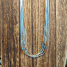 Ten strands of sterling silver beaded together used to create the necklace.