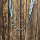 Close-up of necklace's clasp.