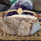 Interior view of handcrafted cuff showing band thickness and fit.