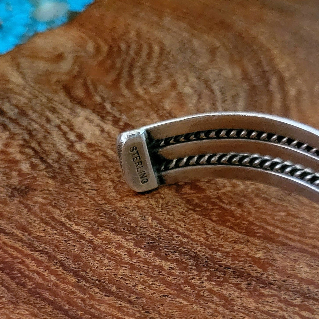 navajo made compressed turquoise cuff bracelet stamp view