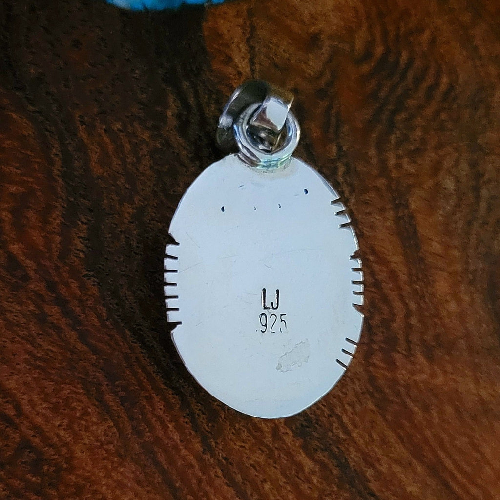 navajo made charoite pendant back view