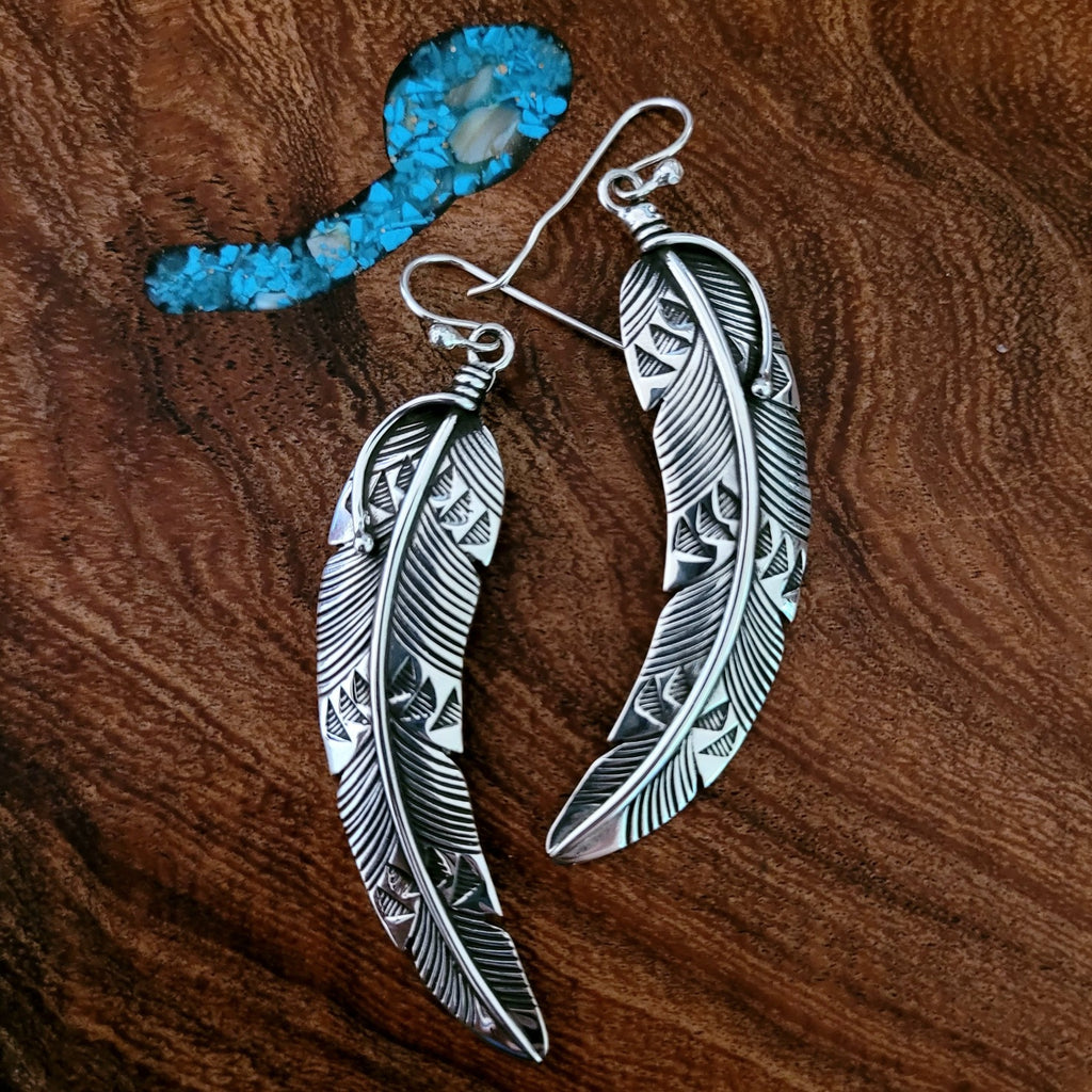 sterling silver feather earrings front view