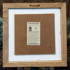 Backside of the Rainbow Yei sand painting, showing the Certificate of Authenticity and Artist information. 