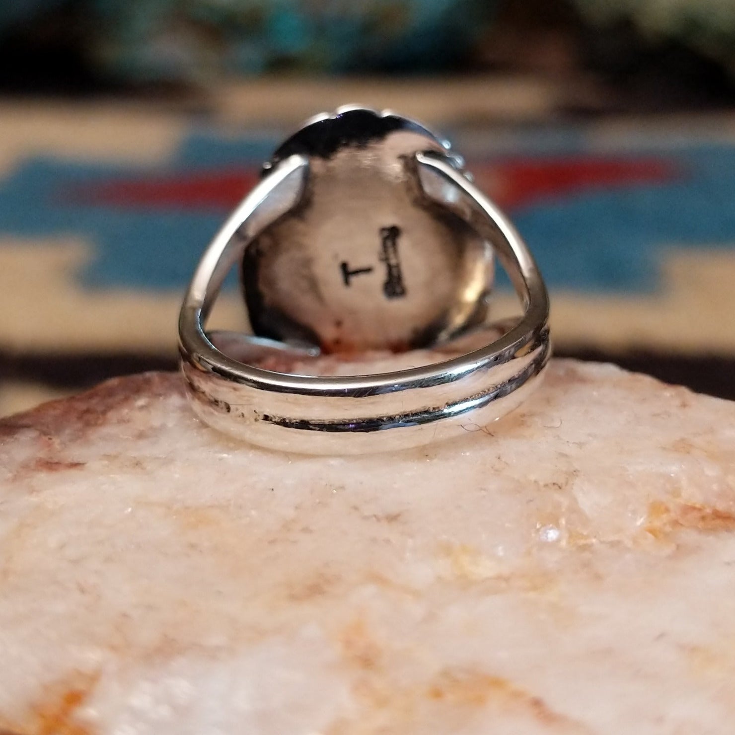 Sterling silver ring with bumblebee jasper and stamped silverwork.