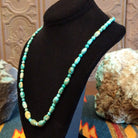 Alternating Sonoran Gold turquoise beads, strung together on the sterling silver chain of the necklace.