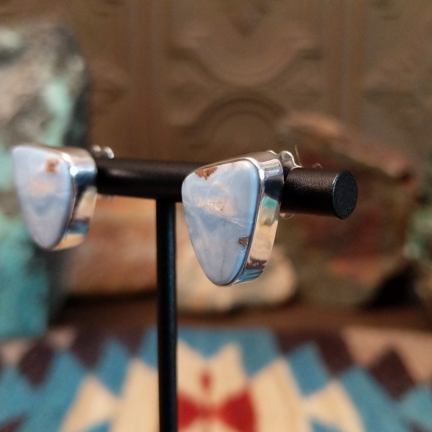 Sterling silver earrings with Arizona blue opal set in triangular bezels.
