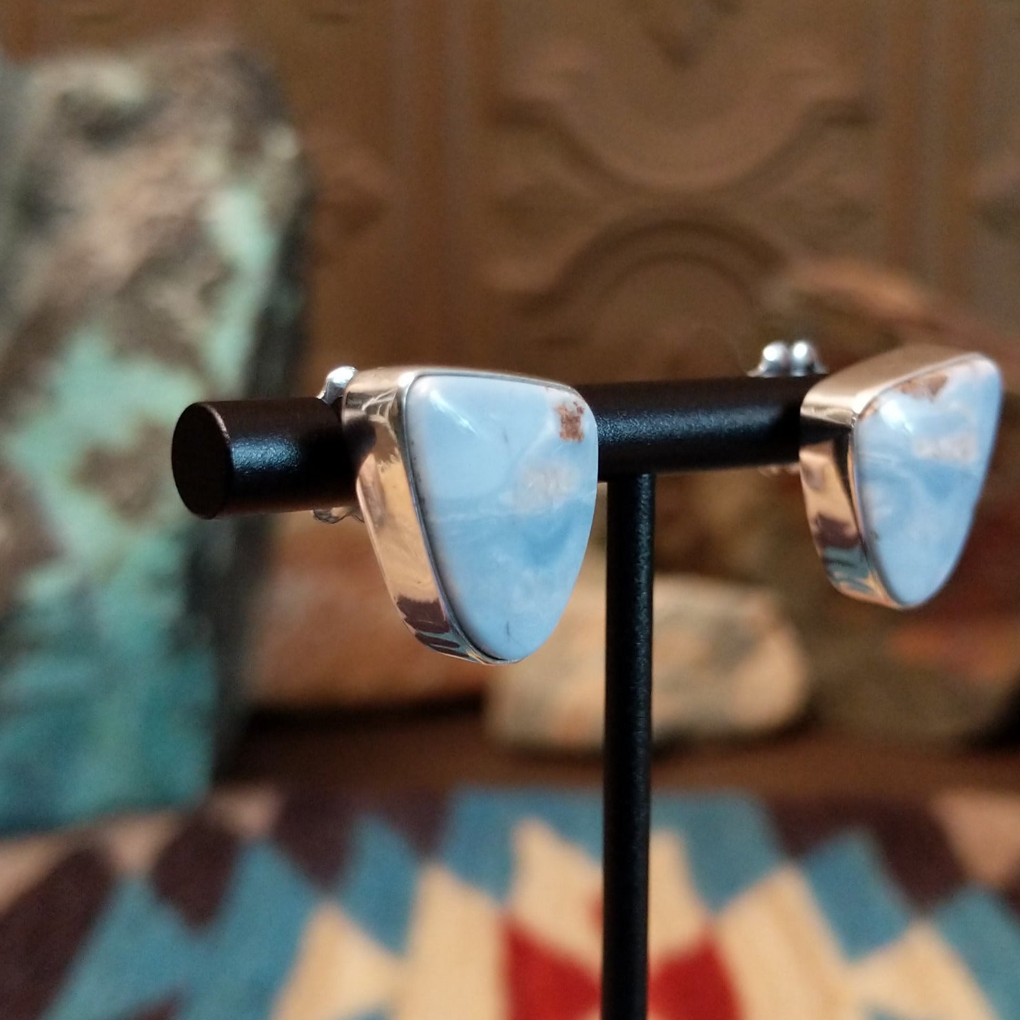 Sterling silver earrings with Arizona blue opal set in triangular bezels.