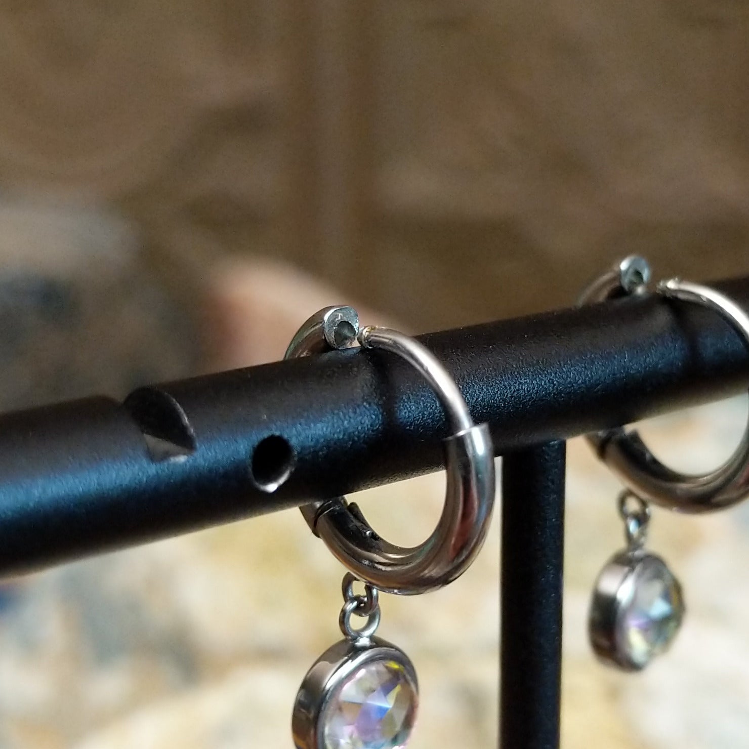 Aurora lunar hoop earrings by LeightWorks, featuring sparkling faceted crystal accents set within elegant lightweight hoops with brilliant light-reflecting detail. Huggie back - Pink