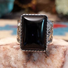 Sterling silver ring featuring Southwestern hand-stamping and black onyx.