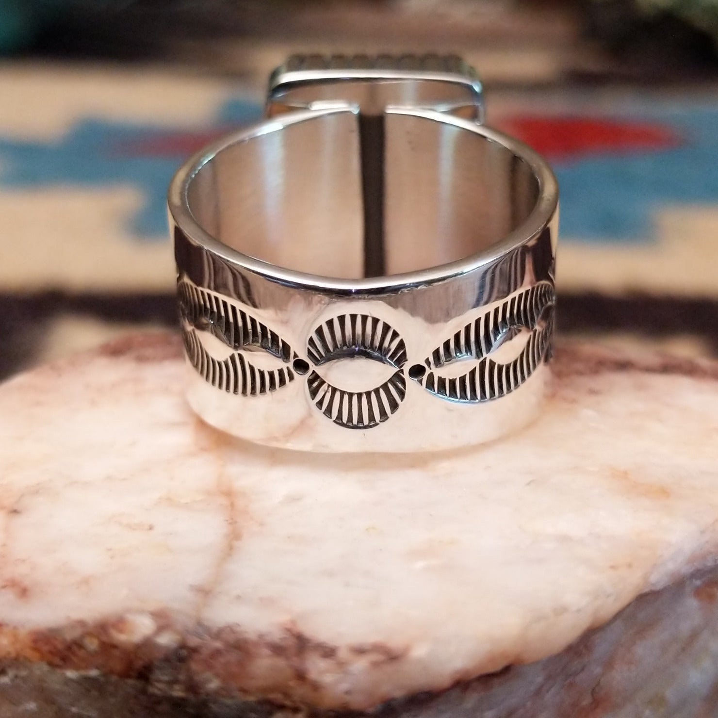 Sterling silver ring featuring Southwestern hand-stamping and black onyx.