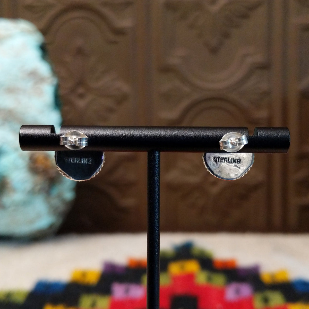 Black Onyx Round Earrings by Peggy Skeets featuring polished round black onyx cabochons set in silver with detailed twisted rope borders; sterling silver stamp.