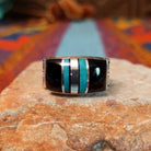 Black Onyx & Turquoise Inlay Ring by Kenneth Bitsie featuring polished black onyx and turquoise inlay separated by Sterling Silver channels.