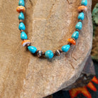 Beaded Blue Gem turquoise and shell necklace strung along the sterling silver chain in a patterned design.
