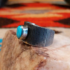Sterling silver ring with ridged band and Blue Ridge turquoise set in the raised bezel.