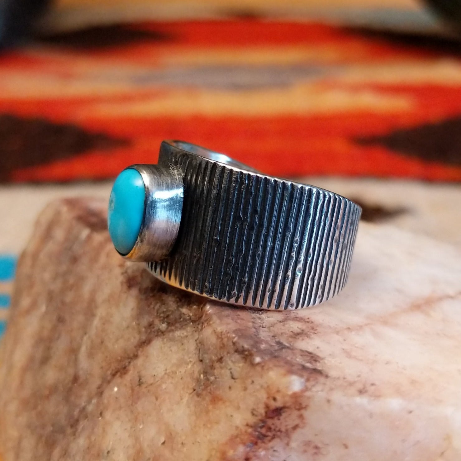 Sterling silver ring with ridged band and Blue Ridge turquoise set in the raised bezel.