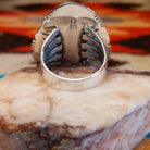 Sterling silver ring with Kingman turquoise set in the large bezel, framed by the stamped setting.