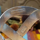 Close up of the artist's stamped signature