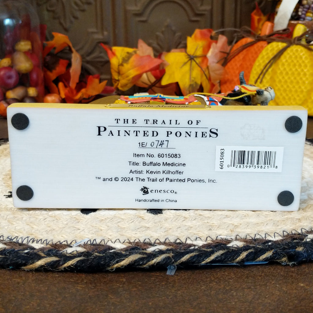 The underside of the base contains information about the piece.