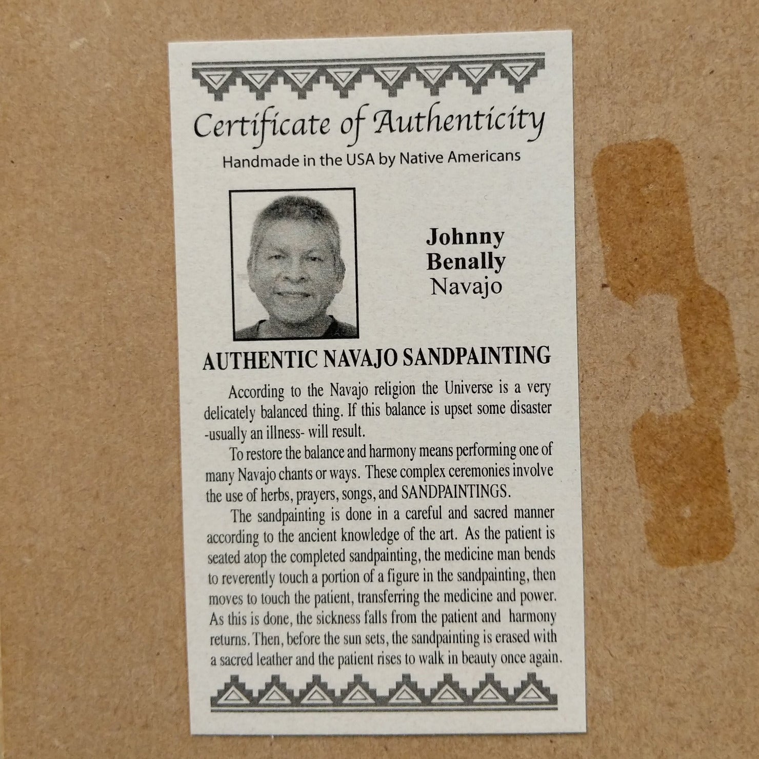 Close up of the Certificate of Authenticity and Artist information. 