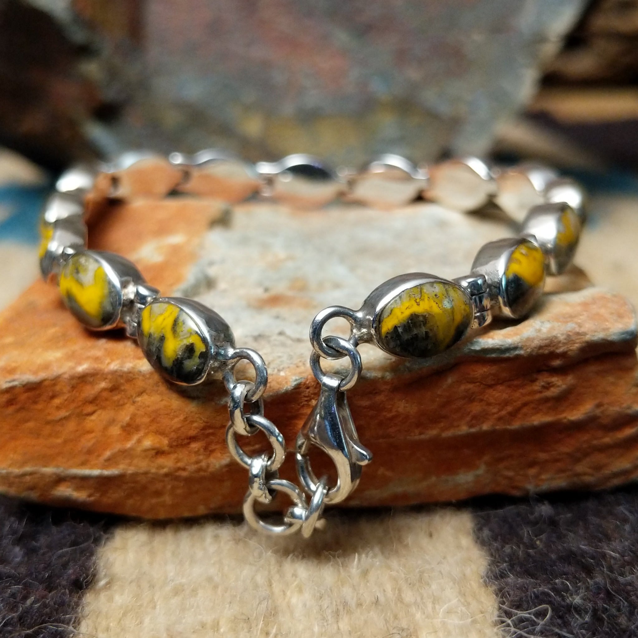 Bumblebee Jasper oval link bracelet by Terry Wood with natural oval stones set in sterling silver; clasp view.