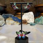Sterling silver necklace and earrings with Austrian crystal set on the butterfly  settings.
