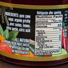Jar of Cheri’s Desert Harvest Prickly Pear Cactus Jelly featuring a bright pink-purple color. Artisanal fruit jelly made from prickly pear cactus, ideal for spreading on baked goods or pairing with cheese.