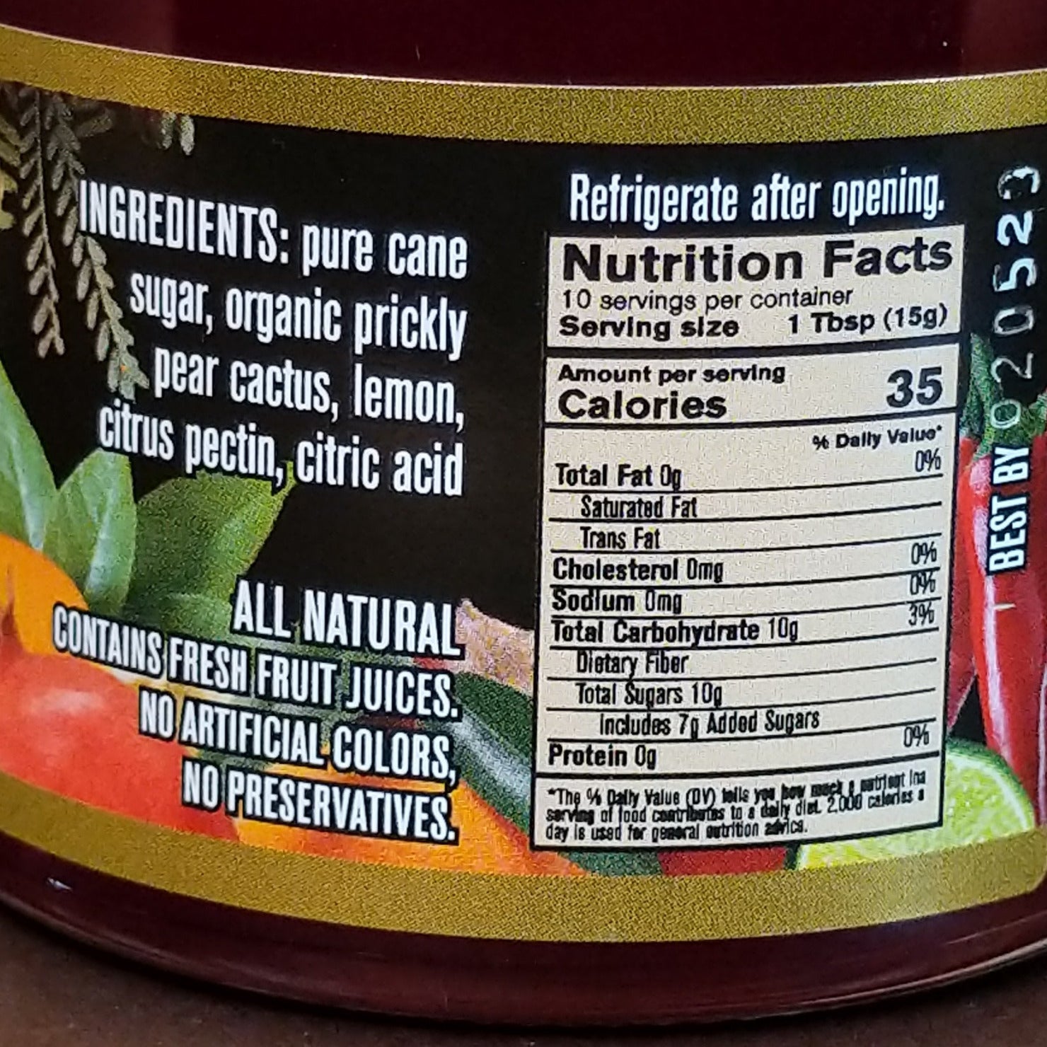 Jar of Cheri’s Desert Harvest Prickly Pear Cactus Jelly featuring a bright pink-purple color. Artisanal fruit jelly made from prickly pear cactus, ideal for spreading on baked goods or pairing with cheese.
