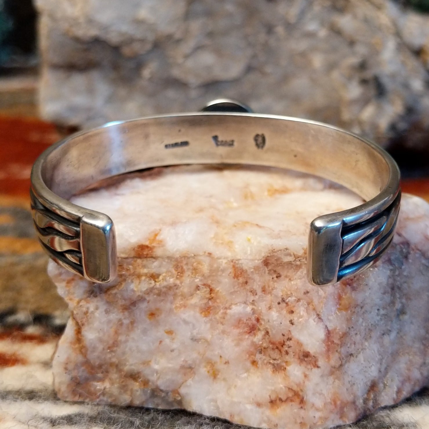 inside /back of silver bracelet
