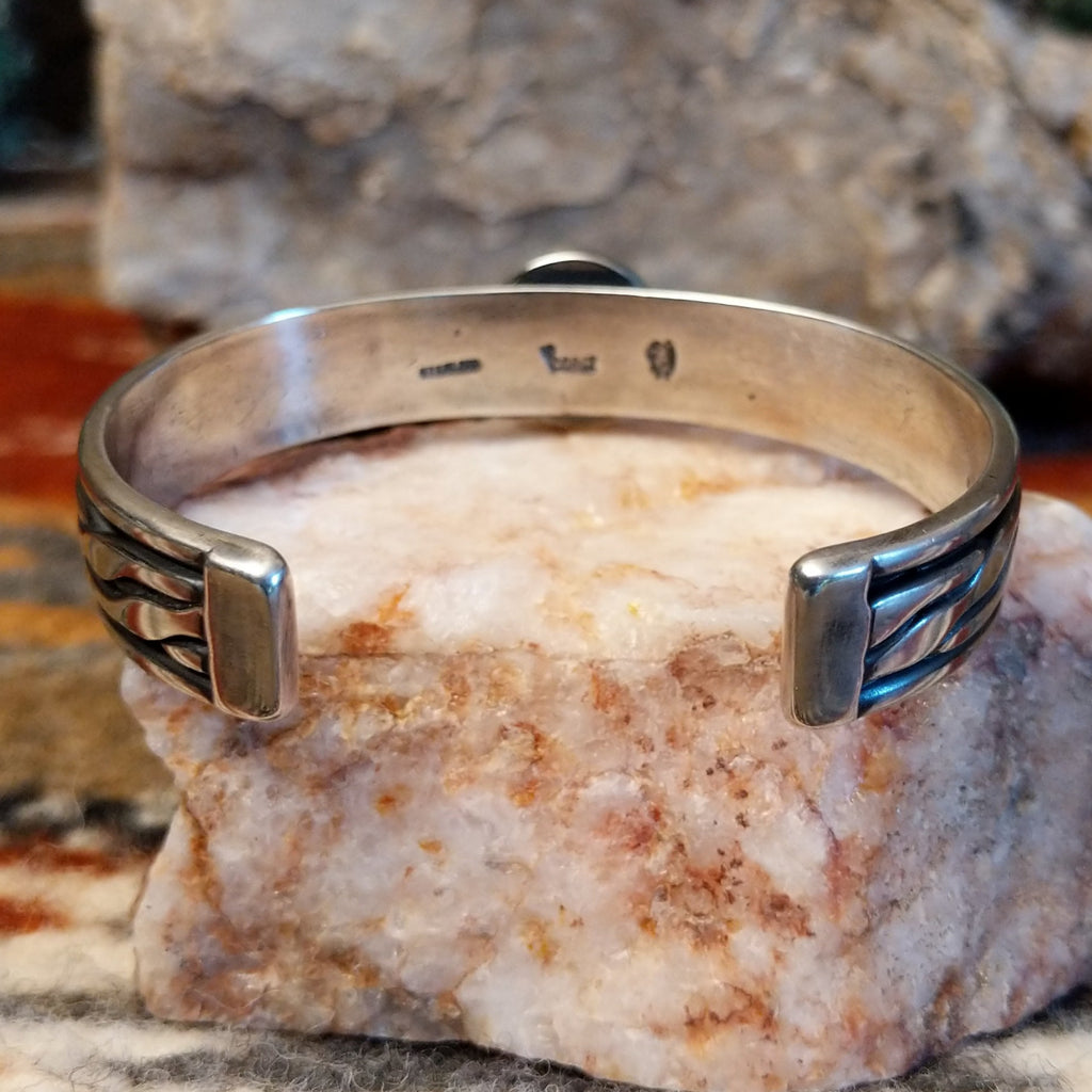 inside /back of silver bracelet