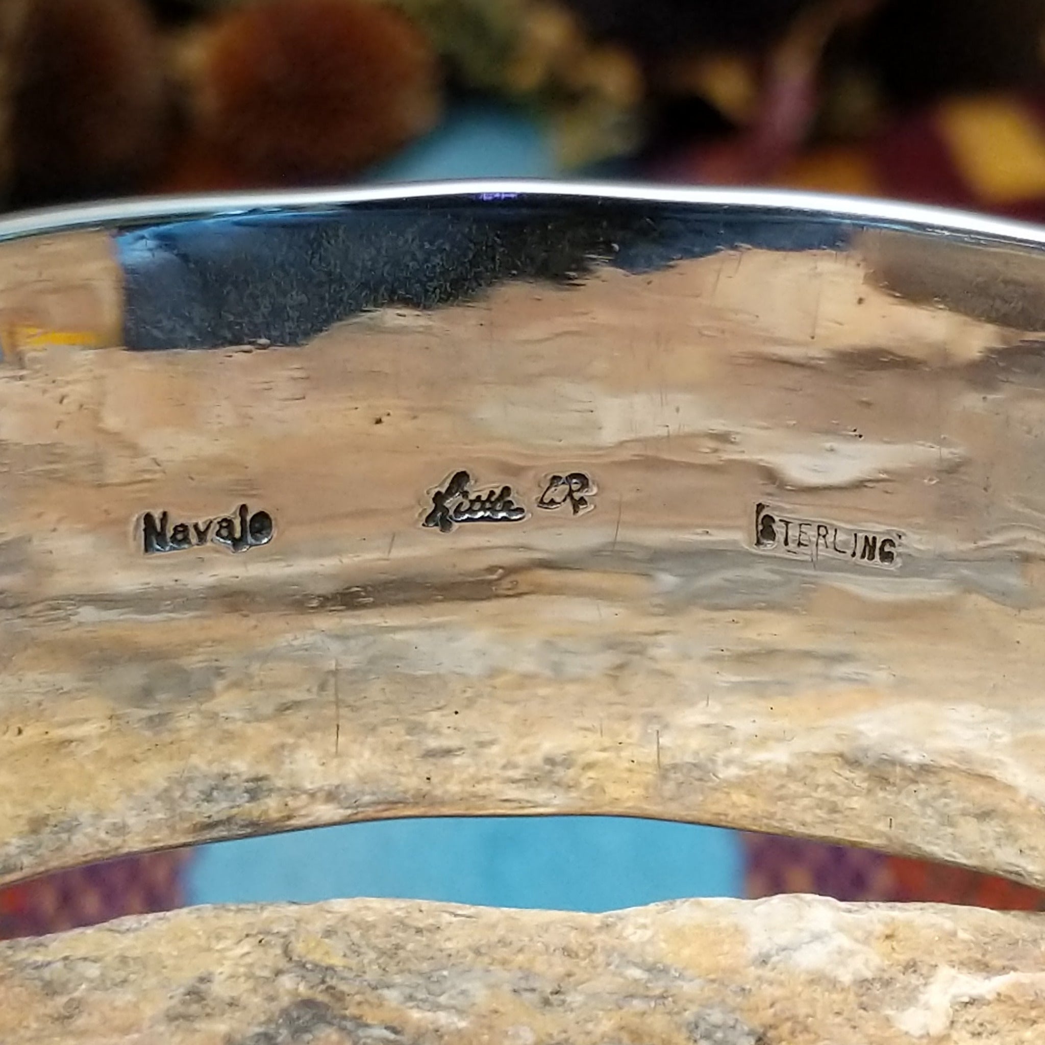Close up of the artisans stamped signatures