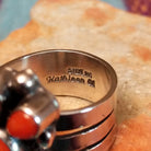 Coral Arrangement Ring by Kathleen Chavez featuring seven red coral stones set in Sterling Silver with polished silver beads and twisted silver accents; artisan and Sterling Silver stamp.