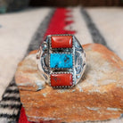 Coral and turquoise silver ring by Pauline Nelson with curved stamped silverwork.